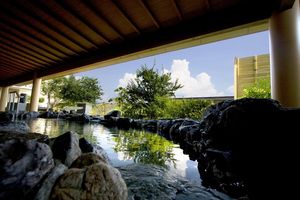 Open-air communal hot spring bath at Ryokan Ayunosato in Hitoyoshi