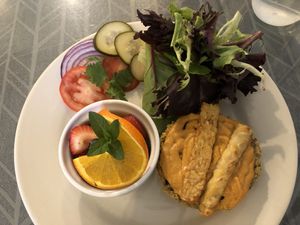 seitan cheese hemp burger with fruit  at Morning Glory Cafe in Flagstaff