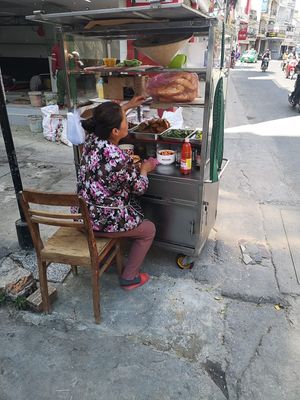 Lovely lady at Banh Mi Chay Co Hoa in Da Lat