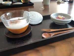 Persimmon pudding, with a fruit jelly palate cleanser.  at Balwoo Gongyang - 발우공양 in Seoul