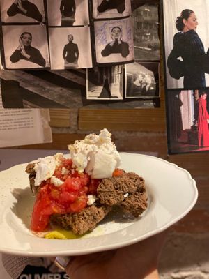 “Dakos” tradicional salad from Crete with carob rusk, tomato and Mότher’s amazing cheese from cashews  at Mother Vegan Bistro in Athens