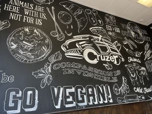 Wall inside the dining area at Cruzer Pizza in Los Angeles