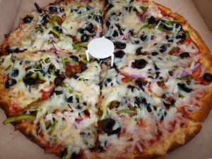 GF veggie pizza with extra cheese at Cruzer Pizza in Los Angeles