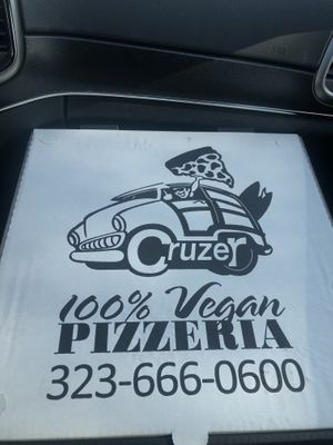 Front of box  at Cruzer Pizza in Los Angeles