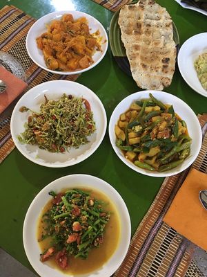 Different vegetarian main dishes and salads at Bamboo Delight in Nyaungshwe