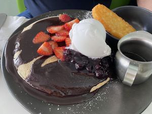 Sounded good on the menu sadly however the pancake was a tad on the dry side and farrrrr too much chocolate   at The Green Edge Cafe and Store in Windsor