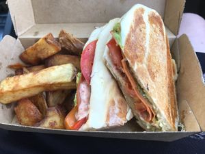 Ham,cheese, tomato and avocado toasty with chips at The Green Edge Cafe and Store in Windsor
