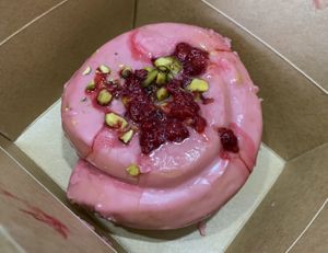 Raspberry & pistachio bun  at Down to Earth Coffee in Brighton