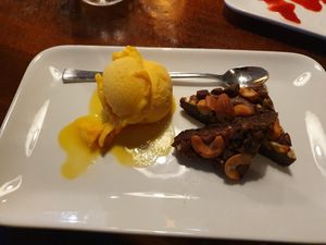 Brownie with mango sorbet at Peppes Pizza in Narvik