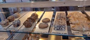 The top shelf is all vegan options (marked V) at Cool Beans in Basel