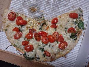 American pan (12") with garlic butter sauce (vegan), vegan cheese, spinach, tomato at Upper Crust in Akron