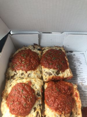 Detroit Style with Vegan Cheese, Pepperoni, and Mushrooms  at Upper Crust in Akron