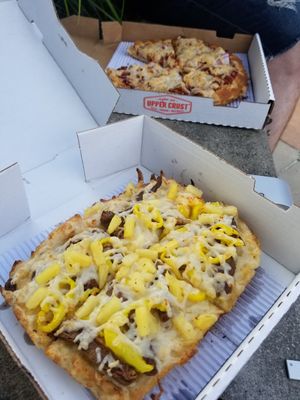 Detroit pan crust with vegan cheese, vegan steak, pineapple and banana peppers at Upper Crust in Akron