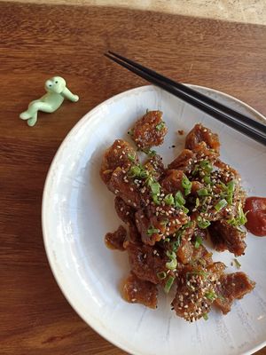 Orange vegan chicken at Vegan Ramen Mei in Puerto Vallarta