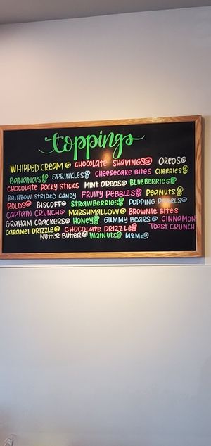 Toppings list with things marked as vegan!!! at Rolling Monkey in Statesboro