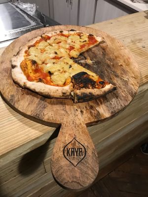 Plain vegan cashew cheese pizza. @eatharmless at Kaya Herb House in Kingston