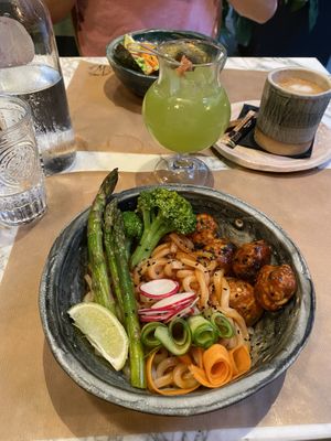 Spicy meatball (and Hawaiian poke bowl in the background)  at Winners Vegan Restaurant in Athens