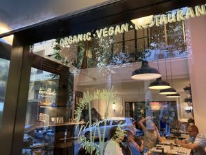 Window sign at Winners Vegan Restaurant in Athens