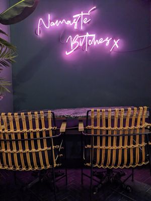 Required neon sign at Winners Vegan Restaurant in Athens