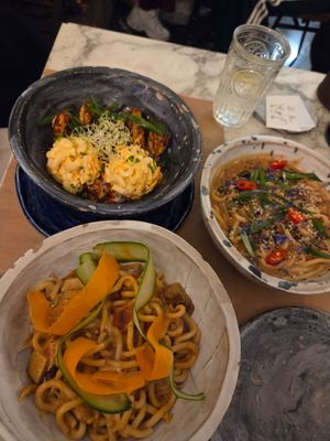 Dynamite seitan, miso udon and dish of the day that was a sweet curry with cashew - super rich and creamy at Winners Vegan Restaurant in Athens