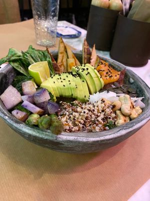 Satay protein bowl! Super heathy quinoa smoked tofu grilled greens no oil and many seeds and nuts!! Sauce made from home made peanut butter and coconut milk at Winners Vegan Restaurant in Athens