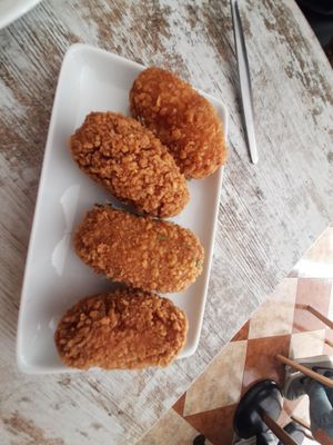 4 differnets stuffed croquetas: mushroom,fake tuna,cheese and ham&cheese) at El Jardi in Mataro