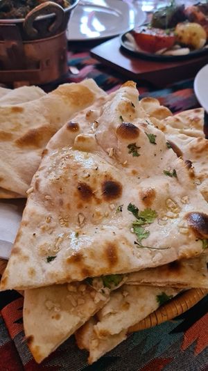 garlic naan bread (vegetarian) at Curry Palace and Tandoor in Bruges