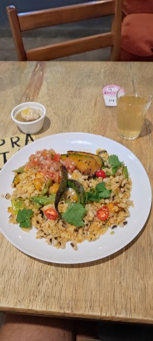 Rice, beans, chilli, fried pumpkin, orange juice (with honey!!) And lemon cake as desert at Pratada  in Sao Paulo