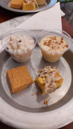 Canjica, cural, paçoca e bolo de milho com cocada (do combinado junino) at Pratada  in Sao Paulo