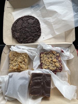 Mudslide Cookie, Peach Bar, Raspberry Bar, two Rice Krispie Bars. All vegan and absolutely delicious!  at Positively 3rd Street Bakery in Duluth