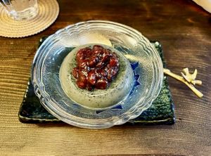 Matcha panna cotta with black sesame seeds, and topped with sweetened Azuki beans.  at Itadakizen Paris in Paris
