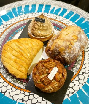 Chausson aux pommes, croissant aux amandes, mont blanc and nuts tartelette at Land & Monkeys - Beaumarchais in Paris