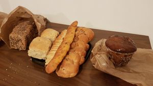 Gluten free bread, fluffy brioches, milk loaf, small bread with dryed tomatoes, Kouglof ! :) at Land & Monkeys - Beaumarchais in Paris