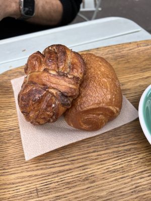 Cinnamon roll (left), Pain au chocolat (right)  at Land & Monkeys - Beaumarchais in Paris