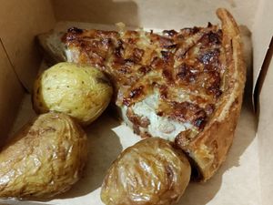 Quiche Lorraine. Very realistic (the potatoes did not come with the meal) at Land & Monkeys - Beaumarchais in Paris