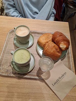 Pain au chocolat, croissant, matcha latte, regular latte at Land & Monkeys - Beaumarchais in Paris