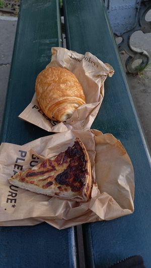 to go: pain au chocolat (1,40€) and quiche lorraine (5,50€) at Land & Monkeys - Beaumarchais in Paris