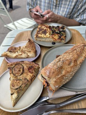 Focaccia, quiche Lorraine, baguette fermier, quiche tomate  at Land & Monkeys - Beaumarchais in Paris