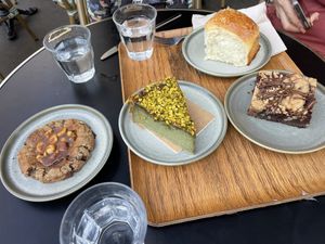 Monkey cookie, pistachio cake, chocolate cake and a plain sweet bread  at Land & Monkeys - Beaumarchais in Paris