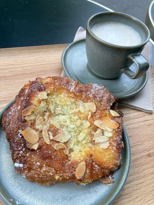 Chocolate almond croissant, cappuccino at Land & Monkeys - Beaumarchais in Paris