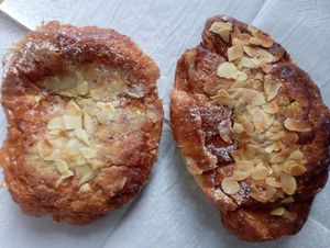 Pain au chocolat aux amandes and Croissant aux amandes at Land & Monkeys - Beaumarchais in Paris