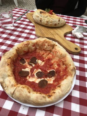 Pizza and calzone  at Al Sanpietrino Trattoria in Lisbon