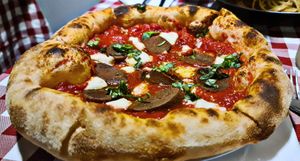 Vegan pizza with pepperoni at Al Sanpietrino Trattoria in Lisbon