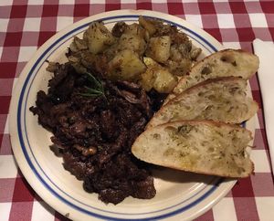 Soy protein with a wine sauce like “rabbit"  at Al Sanpietrino Trattoria in Lisbon