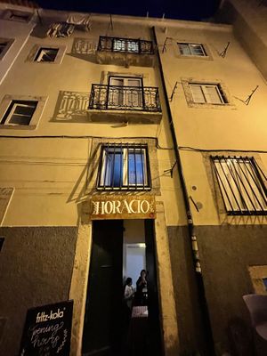 View from the street  at Al Sanpietrino Trattoria in Lisbon