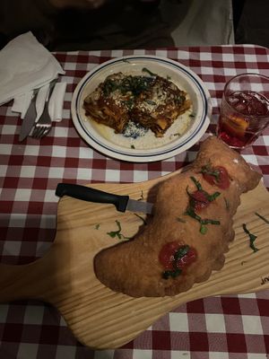 Lasagna alla bolognese and Pizza fritta  at Al Sanpietrino Trattoria in Lisbon