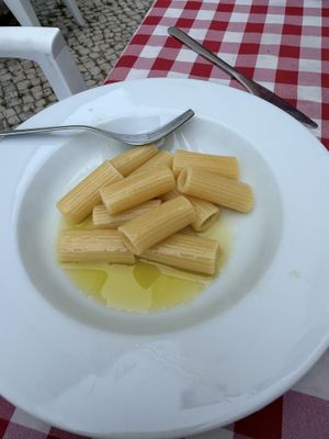 Half size plain pasta with olive oil Sal and pepper  at Al Sanpietrino Trattoria in Lisbon