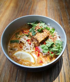 Thai red curry with rice. I added tempe to my bowl. So tasty and filling! at Genius Central in Central Singapore