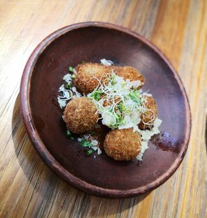 Eggplant balls.  It was crispy on the outside, creamy on the inside. 👍🏼 at Genius Central in Central Singapore