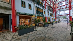 Finding the place in a covered outdoor courtyard at Genius Central in Central Singapore